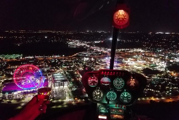Experience the dazzling night skyline of Orlando from a private helicopter surveying iconic theme parks and the shimmering downtown. An unforgettable journey awaits high above the city lights.
